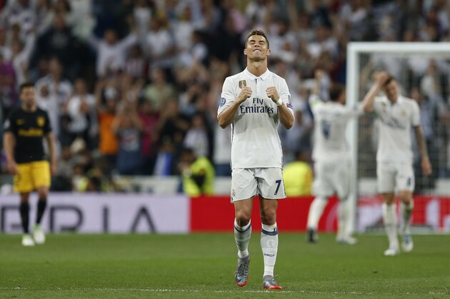 Real Madrid's Cristiano Ronaldo celebrates at the end of the match after the Champions League semifinal first leg soccer match between Real Madrid and Atletico Madrid at the Santiago Bernabeu stadium in Madrid, Spain, Tuesday, May 2, 2017. (AP Photo/Francisco Seco)