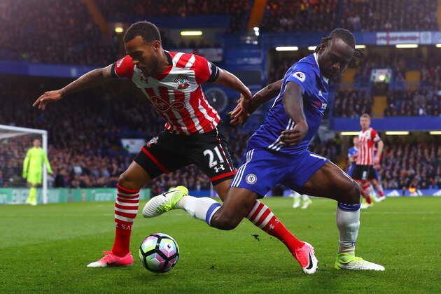 LONDON, ENGLAND - APRIL 25:  Victor Moses of Chelsea and Ryan Bertrand of Southampton battle for the ball during the Premier League match between Chelsea and Southampton at Stamford Bridge on April 25, 2017 in London, England.  (Photo by Clive Rose/Getty Images)
