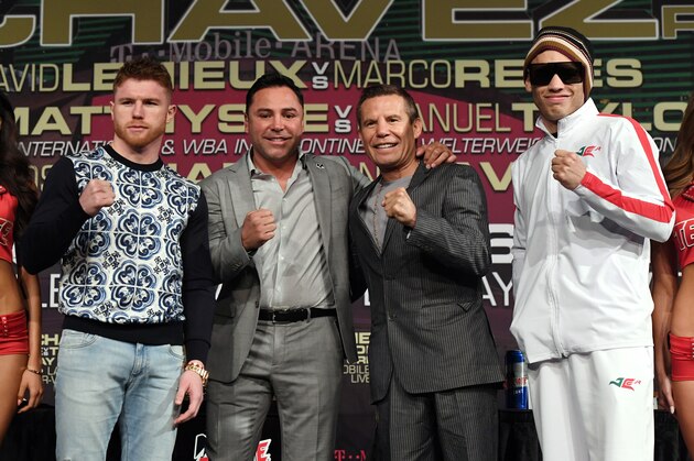 LAS VEGAS, NV - MAY 03:  (L-R) Boxer Canelo Alvarez, Chairman and CEO of Golden Boy Promotions Oscar De La Hoya, former boxer Julio Cesar Chavez Sr. and his son, boxer Julio Cesar Chavez Jr., pose during a news conference at the KA Theatre at MGM Grand Hotel & Casino on May 3, 2017 in Las Vegas, Nevada. Alvarez and Chavez Jr. will meet in a 164.5-pound catch weight bout on May 6 at T-Mobile Arena in Las Vegas.  (Photo by Ethan Miller/Getty Images)