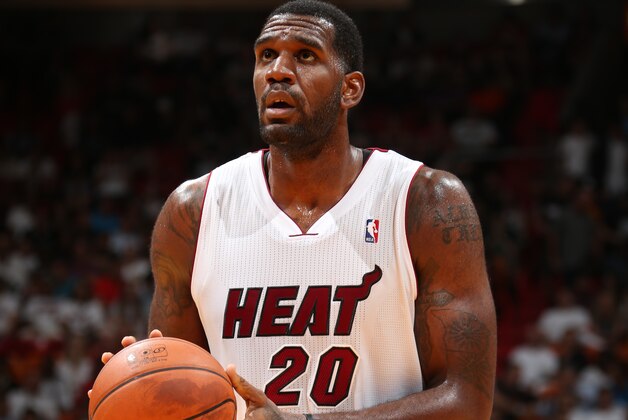 MIAMI, FL - MARCH 21: Greg Oden #20 of the Miami Heat takes a free throw against the Memphis Grizzlies on March 21, 2014 at American Airlines Arena in Miami, Florida. NOTE TO USER: User expressly acknowledges and agrees that, by downloading and or using this photograph, User is consenting to the terms and conditions of the Getty Images License Agreement. Mandatory Copyright Notice: Copyright 2014 NBAE (Photo by Joe Murphy/NBAE via Getty Images)