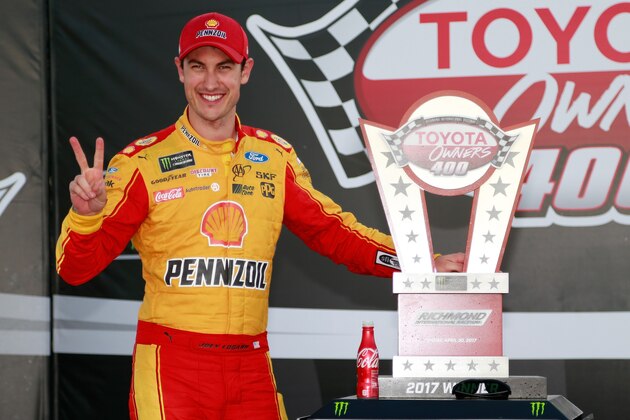 RICHMOND, VA - APRIL 30:  Joey Logano, driver of the #22 Shell Pennzoil Ford, poses with the trophy in Victory Lane after winning the Monster Energy NASCAR Cup Series Toyota Owners 400 at Richmond International Raceway on April 30, 2017 in Richmond, Virginia.  (Photo by Matt Sullivan/Getty Images)