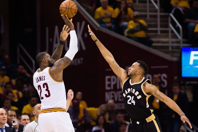 CLEVELAND, OH - MAY 3: LeBron James #23 of the Cleveland Cavaliers shoots over Norman Powell #24 of the Toronto Raptors during the second half of Game Two of the NBA Eastern Conference semifinals at Quicken Loans Arena on May 3, 2017 in Cleveland, Ohio. The Cavaliers defeated the Raptors 125-103. NOTE TO USER: User expressly acknowledges and agrees that, by downloading and or using this photograph, User is consenting to the terms and conditions of the Getty Images License Agreement. (Photo by Jason Miller/Getty Images)