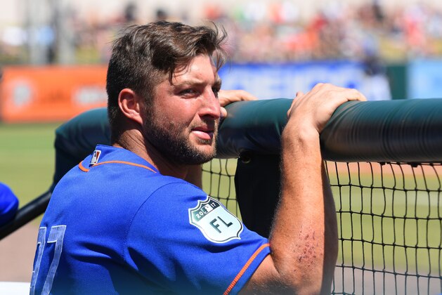 LAKELAND, FL - MARCH 20:  Tim Tebow #97 of the New York Mets looks on from the dugout during the Spring Training game against the Detroit Tigers at Publix Field at Joker Marchant Stadium on March 20, 2017 in Lakeland, Florida. The Tigers defeated the Mets 5-1.  (Photo by Mark Cunningham/MLB Photos via Getty Images)