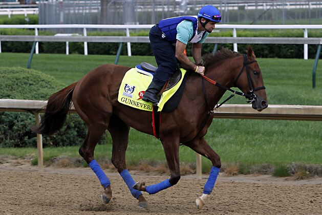 Kentucky Derby 143 hopeful Gunnevera, ridden by exercise rider Victor O'Farrel, gallops at Churchill Downs in Louisville, Ky., Sunday, Apr. 30, 2017. (AP Photo/Garry Jones)