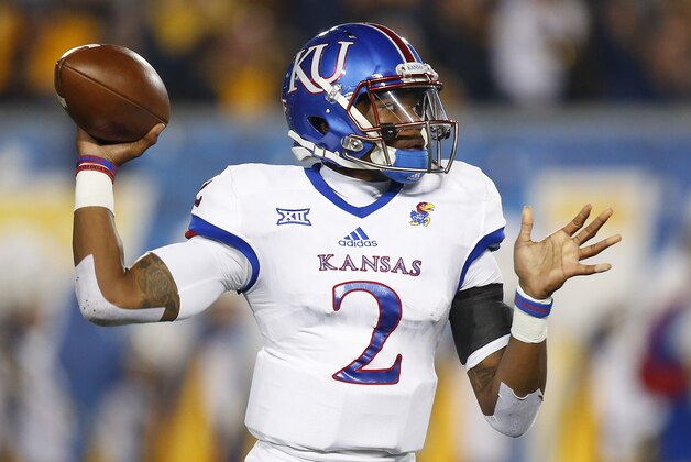 MORGANTOWN, WV - NOVEMBER 05:  Montell Cozart #2 of the Kansas Jayhawks in action against the West Virginia Mountaineers at Mountaineer Field on November 5, 2016 in Morgantown, West Virginia.  (Photo by Justin K. Aller/Getty Images)