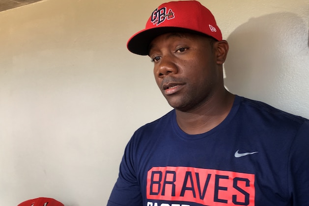 In this photo taken Wednesday, May 3, 2017, Gwinnett Braves' Ryan Howard is interviewed before a minor league baseball game against the Durham Bulls in Gwinnett, Ga. Howard is an MVP, a World Series champion and once one of baseball's most feared sluggers. So what's he doing in the minor leagues at age 37?