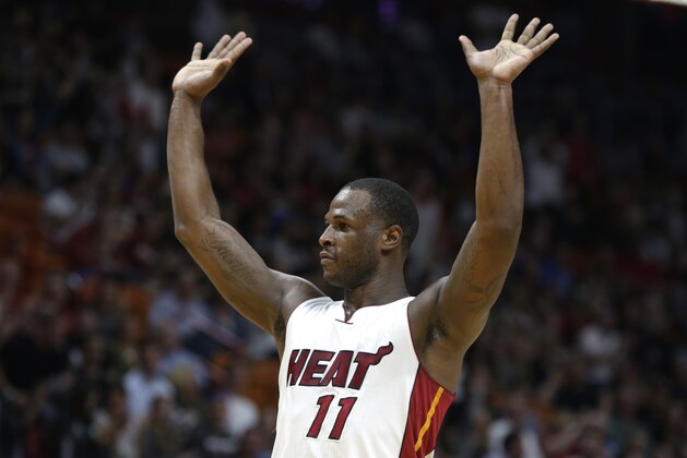 Miami Heat's Dion Waiters (11) reacts after scoring on a dunk during the second half of an NBA basketball game against the Orlando Magic, Monday, Feb. 13, 2017, in Miami. (AP Photo/Lynne Sladky)