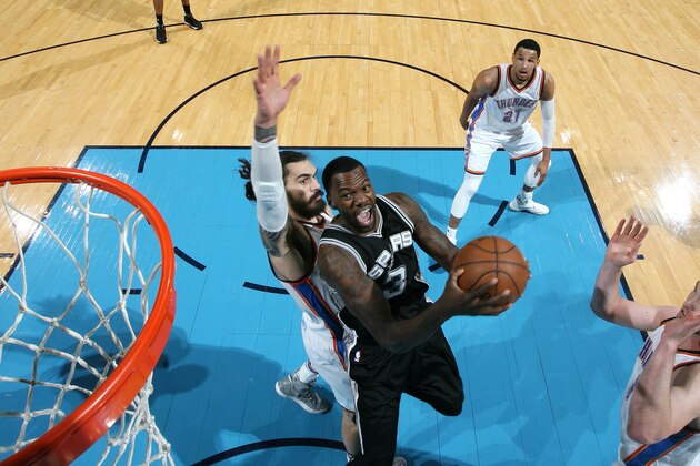 OKLAHOMA CITY, OK- MARCH 31: Dewayne Dedmon #3 of the San Antonio Spurs goes to the basket during the game against the Oklahoma City Thunder on March 31, 2017 at Chesapeake Energy Arena in Oklahoma City, Oklahoma. NOTE TO USER: User expressly acknowledges and agrees that, by downloading and or using this photograph, User is consenting to the terms and conditions of the Getty Images License Agreement. Mandatory Copyright Notice: Copyright 2017 NBAE (Photo by Layne Murdoch/NBAE via Getty Images)