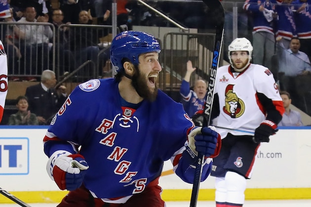 NEW YORK, NY - MAY 04:  Tanner Glass #15 of the New York Rangers celebrates a goal by Oscar Lindberg #24 at 15:54 of the second period against the Ottawa Senators  in Game Four of the Eastern Conference Second Round during the 2017 NHL Stanley Cup Playoffs at Madison Square Garden on May 4, 2017 in New York City.  (Photo by Bruce Bennett/Getty Images)