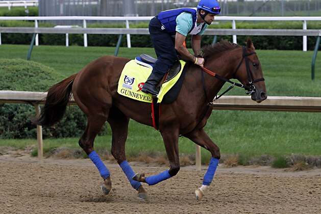 Kentucky Derby 143 hopeful Gunnevera, ridden by exercise rider Victor O'Farrel, gallops at Churchill Downs in Louisville, Ky., Sunday, Apr. 30, 2017. (AP Photo/Garry Jones)