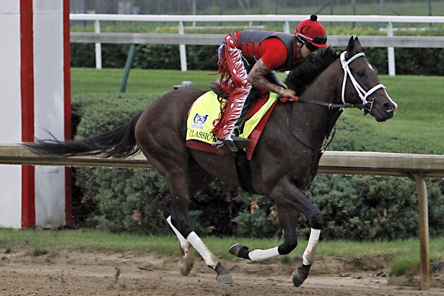 Exercise rider Martin Rivera gallops Kentucky Derby entrant Classic Empire at Churchill Downs in Louisville, Ky., Thursday, May 4, 2017. The Kentucky Derby horse race is set for Saturday, May 6. (AP Photo/Garry Jones)
