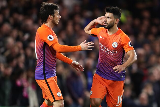 LONDON, ENGLAND - APRIL 05:  Sergio Aguero of Manchester City celebrates scoring his team's first goal to make the score 1-1 with David Silva during the Premier League match between Chelsea and Manchester City at Stamford Bridge on April 5, 2017 in London, England.  (Photo by Chris Brunskill Ltd/Getty Images)