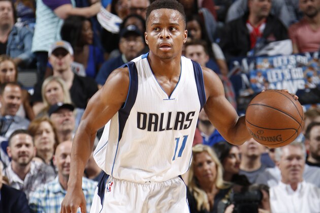 DALLAS, TX - APRIL 11: Yogi Ferrell #11 of the Dallas Mavericks handles the ball against the Denver Nuggets during the game on April 11, 2017 at the American Airlines Center in Dallas, Texas. NOTE TO USER: User expressly acknowledges and agrees that, by downloading and or using this photograph, User is consenting to the terms and conditions of the Getty Images License Agreement. Mandatory Copyright Notice: Copyright 2017 NBAE (Photo by Glenn James/NBAE via Getty Images)