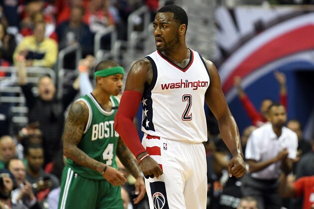 WASHINGTON, DC - MAY 04: John Wall #2 of the Washington Wizards celebrates after scoring in the third quarter against the Boston Celtics in Game Three of the Eastern Conference Semifinals at Verizon Center on May 4, 2017 in Washington, DC. Washington won the game 116-89. NOTE TO USER: User expressly acknowledges and agrees that, by downloading and or using this photograph, User is consenting to the terms and conditions of the Getty Images License Agreement.  (Photo by Greg Fiume/Getty Images)