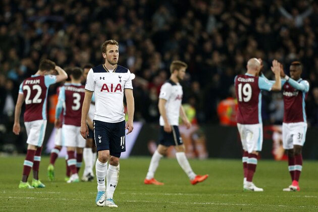Tottenham Hotspur's English striker Harry Kane (3rd L) reacts to their defeat on the pitch after the English Premier League football match between West Ham United and Tottenham Hotspur at The London Stadium, in east London on May 5, 2017.
West Ham won the game 1-0. / AFP PHOTO / Ian KINGTON / RESTRICTED TO EDITORIAL USE. No use with unauthorized audio, video, data, fixture lists, club/league logos or 'live' services. Online in-match use limited to 75 images, no video emulation. No use in betting, games or single club/league/player publications.  /         (Photo credit should read IAN KINGTON/AFP/Getty Images)