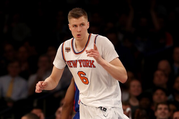 NEW YORK, NY - MARCH 27:  Kristaps Porzingis #6 of the New York Knicks celebrates his basket in the first quarter against the Detroit Pistons at Madison Square Garden on March 27, 2017 in New York City. NOTE TO USER: User expressly acknowledges and agrees that, by downloading and or using this Photograph, user is consenting to the terms and conditions of the Getty Images License Agreement  (Photo by Elsa/Getty Images)