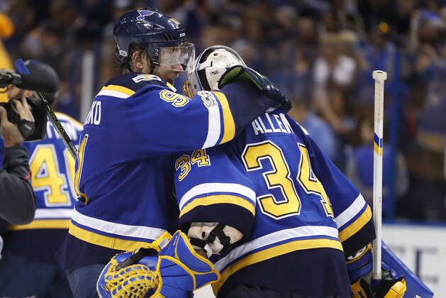 St. Louis Blues right wing Vladimir Tarasenko (91), of Russia, celebrates with goalie Jake Allen (34) after the Blues beat the Nashville Predators 2-1 in Game 5 of an NHL hockey second-round playoff series Friday, May 5, 2017, in St. Louis. The Predators lead the series 3-2. (AP Photo/Jeff Roberson)