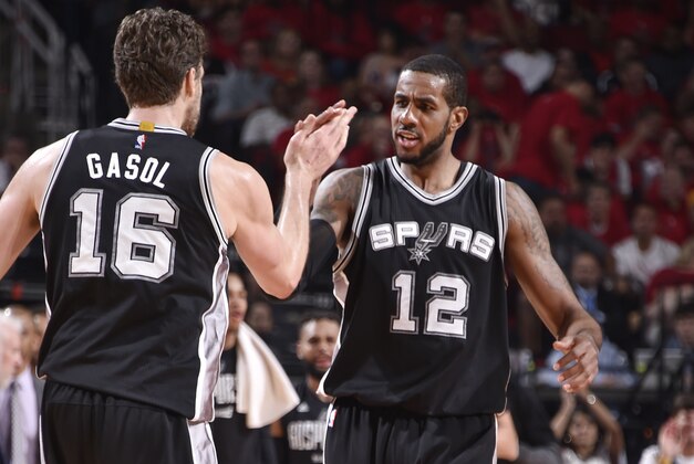 HOUSTON, TX - MAY 5:  LaMarcus Aldridge #12 and Pau Gasol #16 of the San Antonio Spurs celebrate during Game Three of the Western Conference Semifinals of the 2017 NBA Playoffson May 5, 2017 at the Toyota Center in Houston, Texas. NOTE TO USER: User expressly acknowledges and agrees that, by downloading and/or using this photograph, user is consenting to the terms and conditions of the Getty Images License Agreement. Mandatory Copyright Notice: Copyright 2017 NBAE (Photo by Bill Baptist/NBAE via Getty Images)