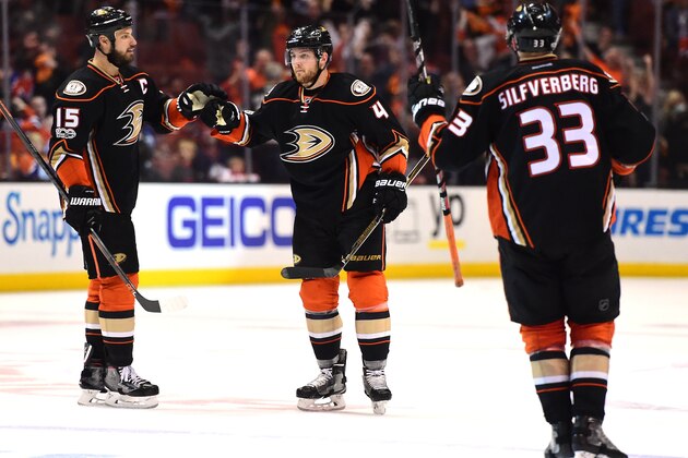 ANAHEIM, CA - MAY 05:  Cam Fowler #4 of the Anaheim Ducks celebrates his goal with Ryan Getzlaf #15 and Jakob Silfverberg #33 to trail 3-2 to the Edmonton Oilers during the third period in Game Five of the Western Conference Second Round during the 2017 NHL Stanley Cup Playoffs at Honda Center on May 5, 2017 in Anaheim, California.  (Photo by Harry How/Getty Images)