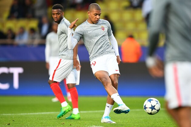 Monaco's French forward Kylian Mbappe warms up prior to the start of the UEFA Champions League semi-final first leg football match Monaco vs Juventus at the Stade Louis II stadium in Monaco on May 3, 2017.  / AFP PHOTO / FRANCK FIFE        (Photo credit should read FRANCK FIFE/AFP/Getty Images)