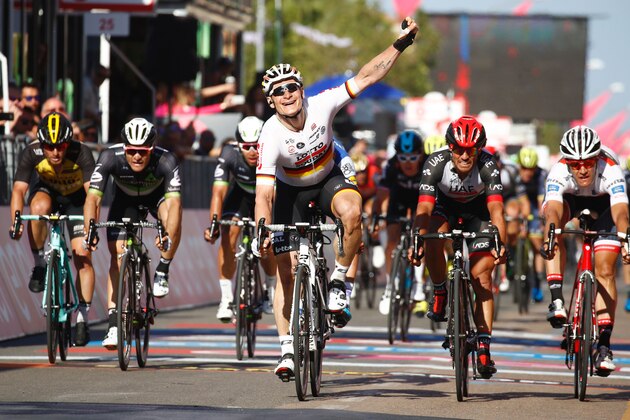 Germany's Andre Greipel (C) of team Lotto-Soudal celebrates as he crosses the finish line to win the second stage of the 100th Giro d'Italia, Tour of Italy, cycling race from Olbia to Tortoli on May 6, 2017 in Sardinia.  / AFP PHOTO / Luk BENIES        (Photo credit should read LUK BENIES/AFP/Getty Images)