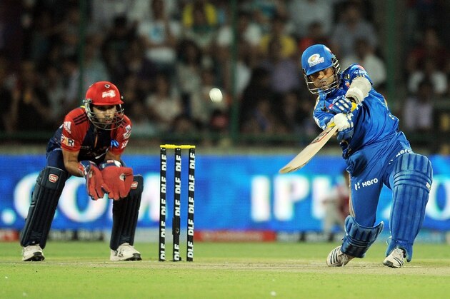 Mumbai Indians cricketer Sachin Tendulkar plays a shot during the IPL Twenty20 cricket match between Delhi Daredevils and Mumbai Indians at the Feroz Shah Kotla stadium in  New Delhi on April 27, 2012.  AFP PHOTO/ MANAN VATSYAYANA      RESTRICTED TO EDITORIAL USE. MOBILE USE WITHIN NEWS PACKAGE        (Photo credit should read MANAN VATSYAYANA/AFP/GettyImages)