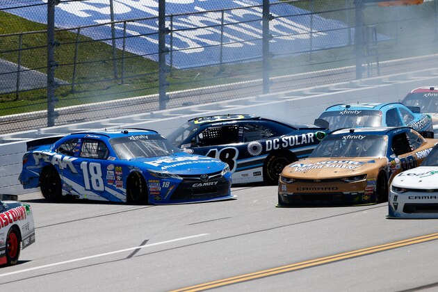 TALLADEGA, AL - MAY 06: Daniel Suarez, driver of the #18 Peak Antifreeze & Coolant Toyota, and Brennan Poole, driver of the #48 DC Solar Chevrolet, have an on track incident during the NASCAR XFINITY Series Sparks Energy 300 at Talladega Superspeedway on May 6, 2017 in Talladega, Alabama.  (Photo by Brian Lawdermilk/Getty Images)