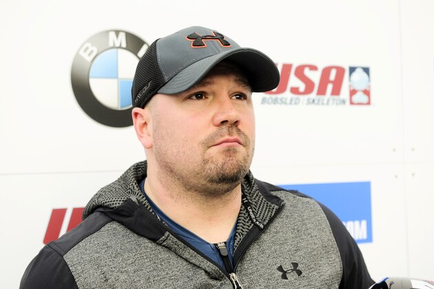 Driver Steven Holcomb, of the United States, talks with reporters in the finish area after winning the mens two-man bobsled World Cup race  on Friday, Dec. 16, 2016, in Lake Placid, N.Y. (AP Photo/Hans Pennink)