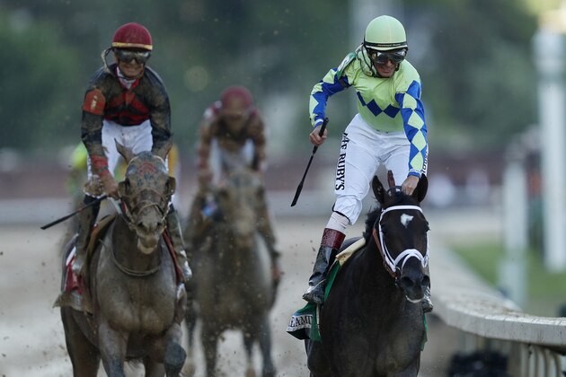 LOUISVILLE, KY - MAY 06:  Jockey John Velazquez celebrates atop Always Dreaming #5 as they cross the finish line after winning the 143rd running of the Kentucky Derby at Churchill Downs on May 6, 2017 in Louisville, Kentucky.  (Photo by Patrick Smith/Getty Images)