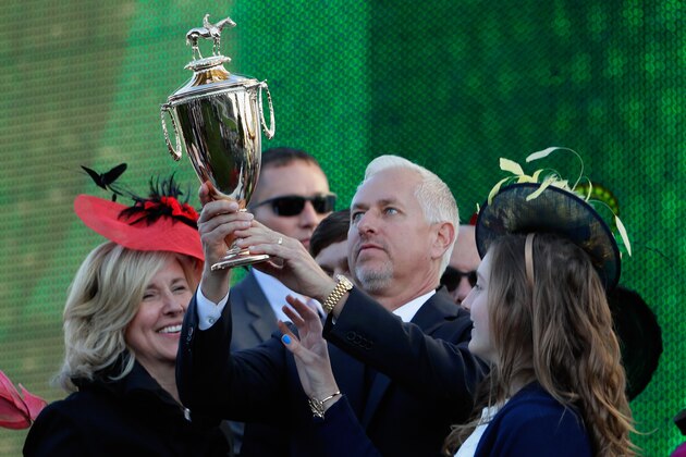 LOUISVILLE, KY - MAY 06:  Trainer Todd Pletcher holds up the trophy after Always Dreaming won the 143rd running of the Kentucky Derby at Churchill Downs on May 6, 2017 in Louisville, Kentucky.  (Photo by Jamie Squire/Getty Images)