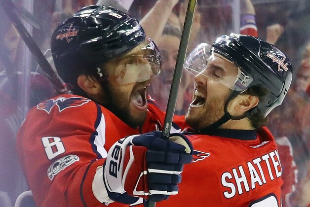 WASHINGTON, DC - MAY 06: Alex Ovechkin #8 of the Washington Capitals scores at 7:47 of the third period against the Pittsburgh Penguins and is embraced by Kevin Shattenkirk #22 in Game Five of the Eastern Conference Second Round during the 2017 NHL Stanley Cup Playoffs at the Verizon Center on May 6, 2017 in Washington, DC.  (Photo by Bruce Bennett/Getty Images)