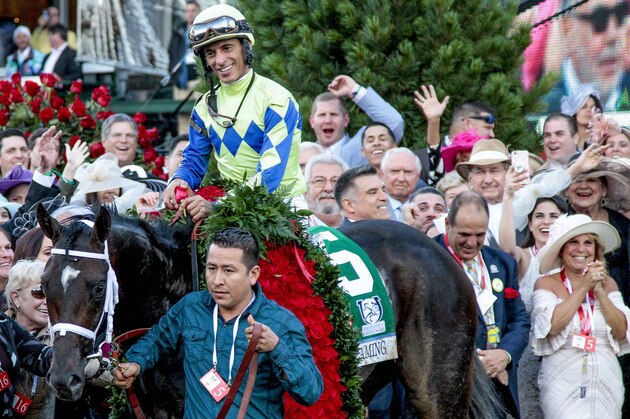 LOUISVILLE, KY - MAY 06: Winning jockey John Velazquaz enters the winner's circle after Always Dreaming #5 won the Kentucky Derby on Kentucky Derby Day at Churchill Downs on May 6, 2017 in Louisville, Kentucky. (Photo by Candice Chavez/Eclipse Sportswire/Getty Images)
