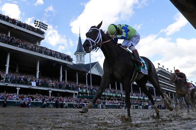 LOUISVILLE, KY - MAY 06:  Jockey John Velazquez celebrates as he guides Always Dreaming #5 across the finish line to win the 143rd running of the Kentucky Derby at Churchill Downs on May 6, 2017 in Louisville, Kentucky.  (Photo by Rob Carr/Getty Images)