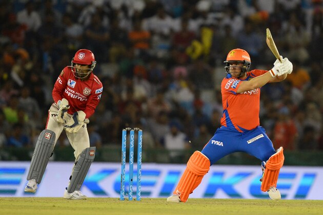 Gujarat Lions Aaron Finch plays a shot as Kings XI Punjab wicketkeeper Wriddhiman Saha looks on during the 2016 Indian Premier League (IPL) Twenty20 cricket match between Gujarat Lions and Kings XI Punjab at The Punjab Cricket Association Stadium in Mohali on April 11, 2016. ------IMAGE RESTRICTED TO EDITORIAL USE - STRICTLY NO COMMERCIAL USE- / AFP / SAJJAD HUSSAIN (Photo credit should read SAJJAD HUSSAIN/AFP/Getty Images) Gujarat Lions Aaron Finch plays a shot as Kings XI Punjab wicketkeeper Wriddhiman Saha looks on during the 2016 Indian Premier League (IPL) Twenty20 cricket match between Gujarat Lions and Kings XI Punjab at The Punjab Cricket Association Stadium in Mohali on April 11, 2016. ------IMAGE RESTRICTED TO EDITORIAL USE - STRICTLY NO COMMERCIAL USE- / AFP / SAJJAD HUSSAIN (Photo credit should read SAJJAD HUSSAIN/AFP/Getty Images)