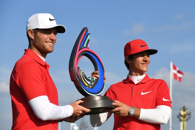 ST ALBANS, ENGLAND - MAY 07:  Thorbjorn Olesen and Lucas Bjerregaard of Denmark pose with the trophy after winning the final match between Denmark and Australia during day two of GolfSixes at The Centurion Club on May 7, 2017 in St Albans, England.  (Photo by Ross Kinnaird/Getty Images)