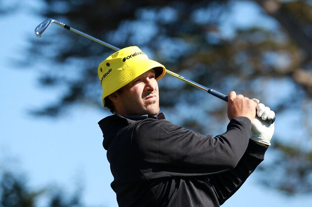 PEBBLE BEACH, CA - FEBRUARY 09:  Tony Romo of the Dallas Cowboys watches his tee shot on the 17th hole during the third round of the AT&T Pebble Beach National Pro-Am at Pebble Beach Golf Links on February 9, 2013 in Pebble Beach, California.  (Photo by Jed Jacobsohn/Getty Images)