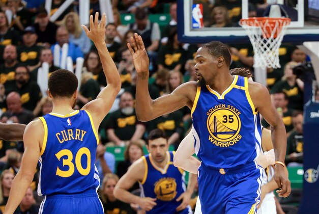 May 6, 2017; Salt Lake City, UT, USA;  Golden State Warriors forward Kevin Durant (35) and Golden State Warriors guard Stephen Curry (30) celebrate after Durant scores against the Utah Jazz during the third quarter in game three of the second round of the 2017 NBA Playoffs at Vivint Smart Home Arena. Mandatory Credit: Chris Nicoll-USA TODAY Sports