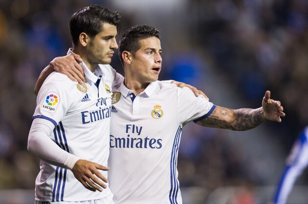 LA CORUNA, SPAIN - APRIL 26:  James Rodriguez of Real Madrid celebrates with his teammates Alvaro Morata of Real Madrid after scoring his team's fourth goal during the La Liga match between RC Deportivo La Coruna and Real Madrid at Riazor Stadium on April 26, 2017 in La Coruna, Spain.  (Photo by Juan Manuel Serrano Arce/Getty Images)