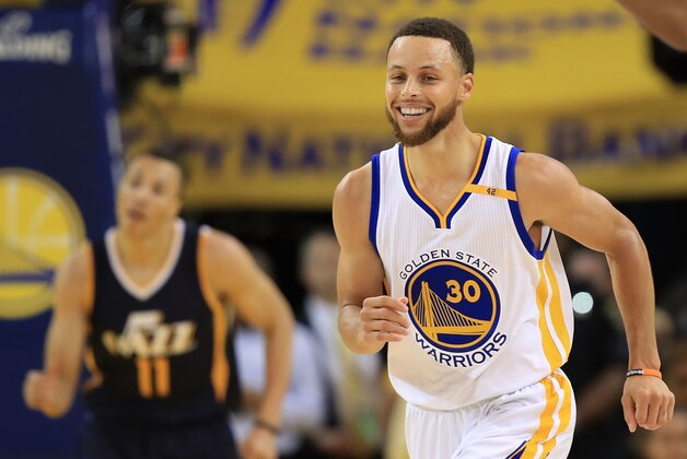 OAKLAND, CA - MAY 04:  Stephen Curry #30 of the Golden State Warriors reacts after hitting a three-point basket against the Utah Jazz during Game Two of the NBA Western Conference Semi-Finals at ORACLE Arena on May 4, 2017 in Oakland, California.  NOTE TO USER: User expressly acknowledges and agrees that, by downloading and or using this photograph, User is consenting to the terms and conditions of the Getty Images License Agreement.  (Photo by Ezra Shaw/Getty Images)