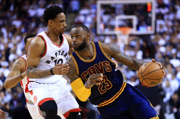 TORONTO, ON - MAY 05:  Lebron James #23 of the Cleveland Cavaliers dribbles the ball as DeMar DeRozan #10 of the Toronto Raptors defends in the second half of Game Three of the Eastern Conference Semifinals during the 2017 NBA Playoffs at Air Canada Centre on May 5, 2017 in Toronto, Canada.  NOTE TO USER: User expressly acknowledges and agrees that, by downloading and or using this photograph, User is consenting to the terms and conditions of the Getty Images License Agreement.  (Photo by Vaughn Ridley/Getty Images)