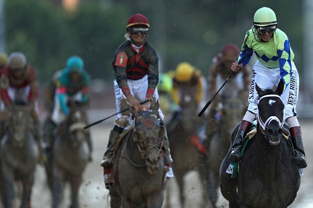 LOUISVILLE, KY - MAY 06: Jockey John Velazquez celebrates atop Always Dreaming #5 as they cross the finish line after winning the 143rd running of the Kentucky Derby at Churchill Downs on May 6, 2017 in Louisville, Kentucky. (Photo by Patrick Smith/Getty Images)