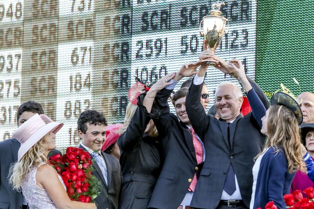 LOUISVILLE, KY - MAY 06: Connections and Trainer Todd Pletcher hold up the winner's trophy after  Always Dreaming #5 won the Kentucky Derby on Kentucky Derby Day at Churchill Downs on May 6, 2017 in Louisville, Kentucky. (Photo by Candice Chavez/Eclipse Sportswire/Getty Images)