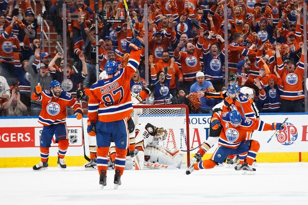EDMONTON, AB - MAY 3:  Drake Caggiula #36 celebrates his goal with teammates Patrick Maroon #19, Connor McDavid #97 and Jordan Eberle #14 of the Edmonton Oilers as goalie John Gibson #36 of the Anaheim Ducks reacts in Game Four of the Western Conference Second Round during the 2017 NHL Stanley Cup Playoffs at Rogers Place on May 3, 2017 in Edmonton, Alberta, Canada. (Photo by Codie McLachlan/Getty Images)