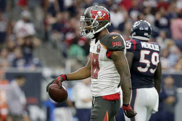 HOUSTON, TX - SEPTEMBER 27: Louis Murphy #18 of the Tampa Bay Buccaneers celebrates a first down against the Houston Texans in the fourth quarter on September 27, 2015 at NRG Stadium in Houston, Texas. Texans won 19 to 9.(Photo by Thomas B. Shea/Getty Images)