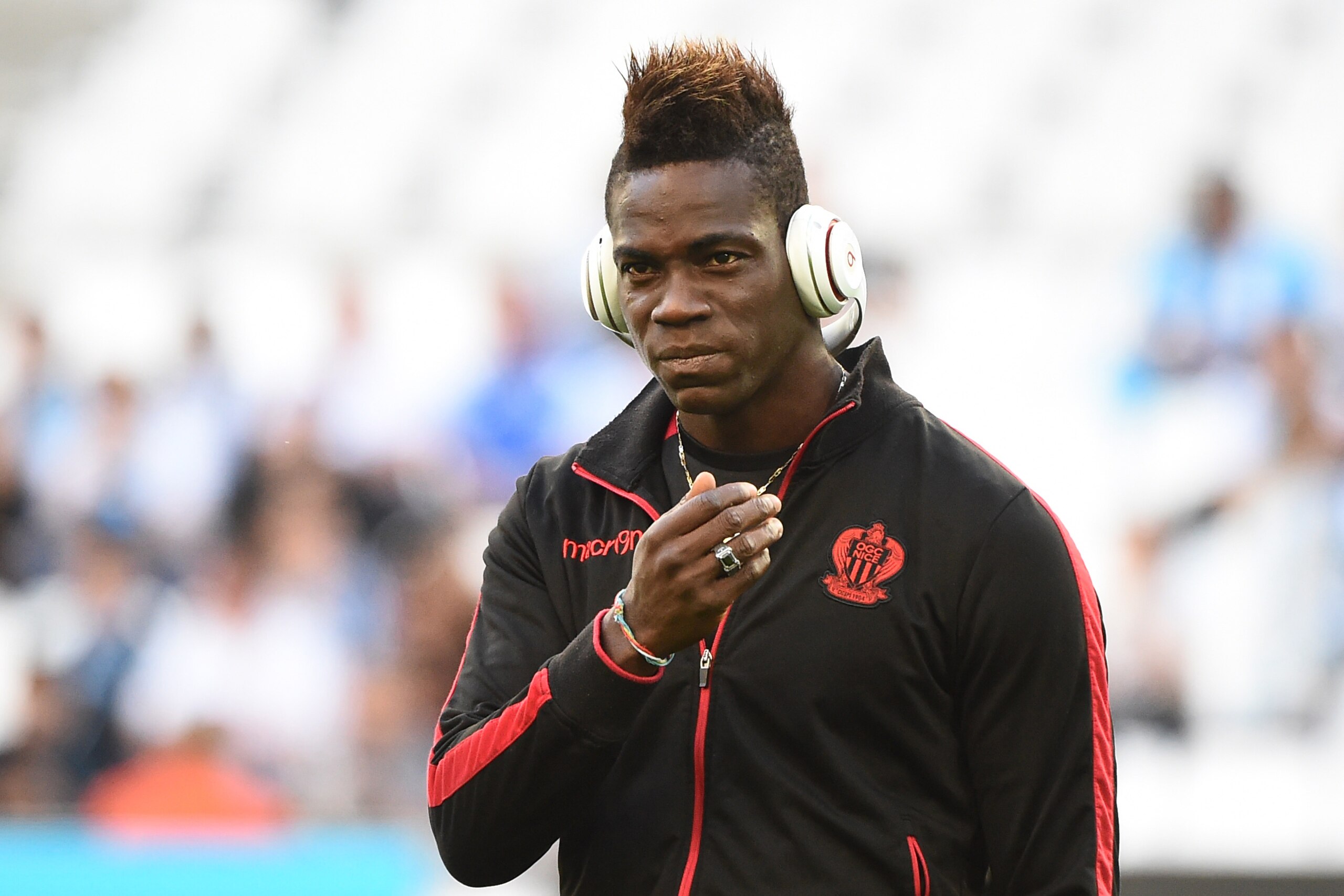 Nice's Italian forward Mario Balotelli arrives for the warm up session prior to the French L1 football match betweem Olympique of Marseille (OM) and Nice at the Velodrome stadium in Marseille, on May 7, 2017. / AFP PHOTO / BORIS HORVAT        (Photo credit should read BORIS HORVAT/AFP/Getty Images)