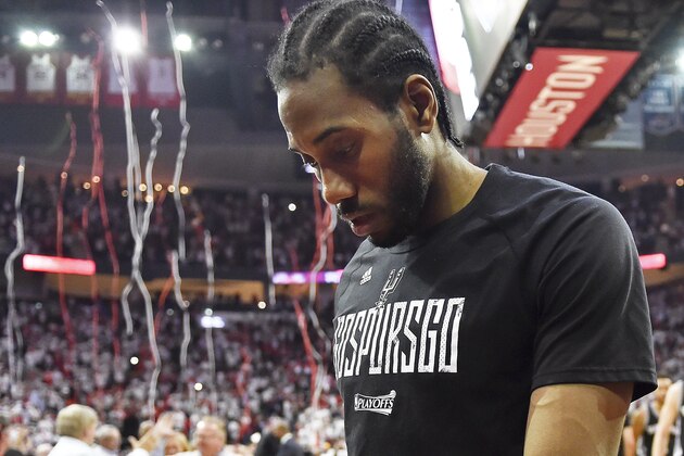 San Antonio Spurs forward Kawhi Leonard leaves the court following the team's 125-104 lost to the Houston Rockets in Game 4 of an NBA basketball second-round playoff series, Sunday, May 7, 2017, in Houston. (AP Photo/Eric Christian Smith)