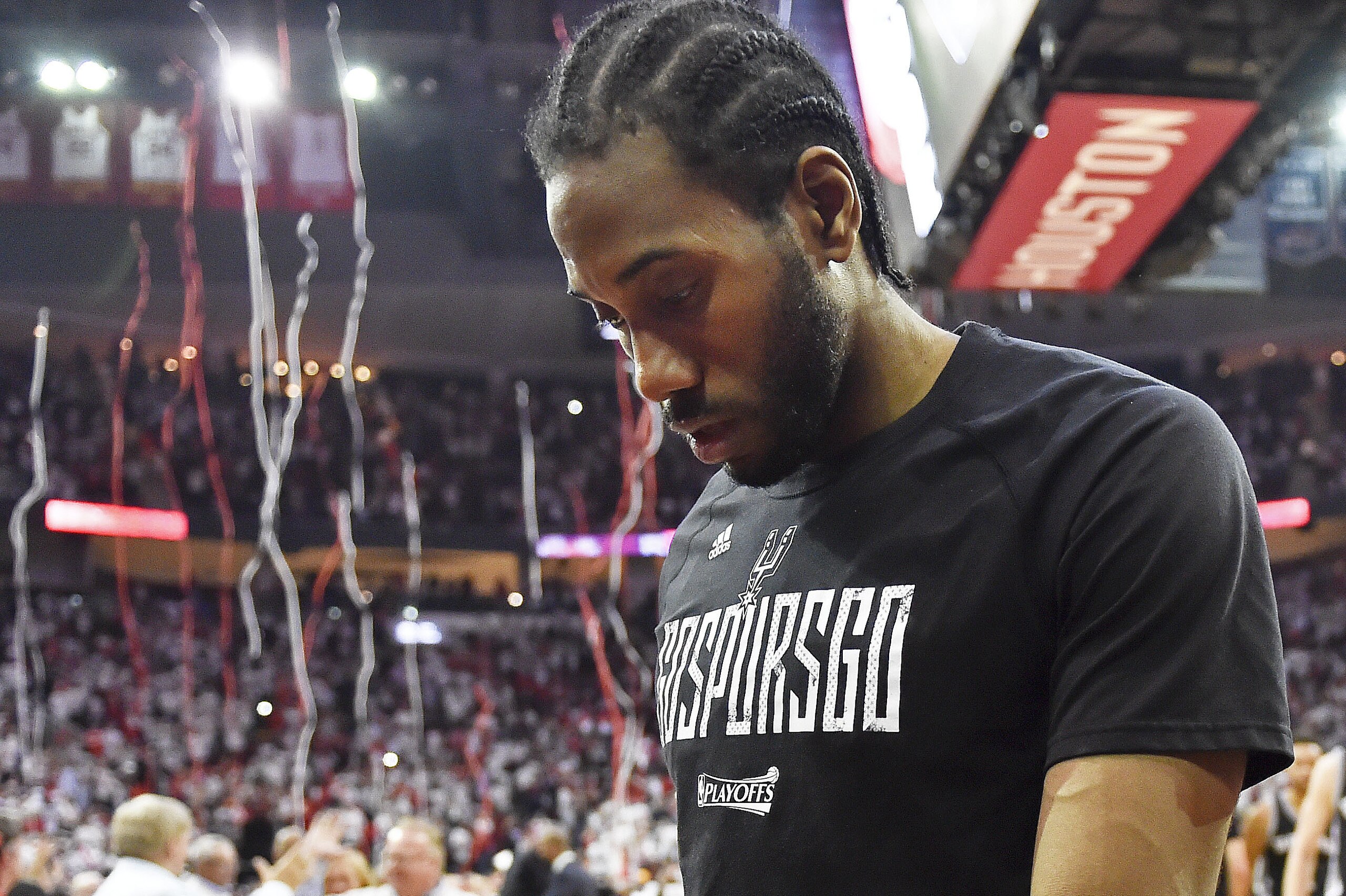 San Antonio Spurs forward Kawhi Leonard leaves the court following the team's 125-104 lost to the Houston Rockets in Game 4 of an NBA basketball second-round playoff series, Sunday, May 7, 2017, in Houston. (AP Photo/Eric Christian Smith)