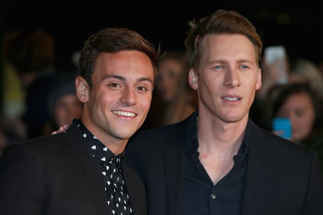 LONDON, ENGLAND - NOVEMBER 05:  Tom Daley and Dustin Lance Black attend 'The Hunger Games: Mockingjay Part 2' UK Premiere at the Odeon Leicester Square on November 5, 2015 in London, England.  (Photo by Chris Jackson/Getty Images)
