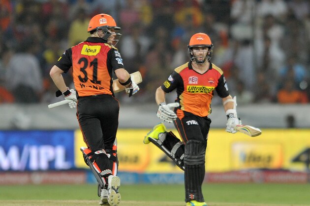 Sunrisers Hyderabad captain David Warner (L) and Kane Williamson run between the wickets during the 2016 Indian Premier League (IPL) Twenty20 cricket match between Sunrisers Hyderabad and Royal Challengers Bangalore at The Rajiv Gandhi International Stadium in Hyderabad  on April 30, 2016.  / AFP / NOAH SEELAM        (Photo credit should read NOAH SEELAM/AFP/Getty Images)