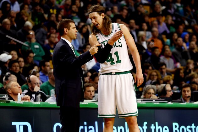 BOSTON, MA - NOVEMBER 11: Kelly Olynyk #41 of the Boston Celtics speaks with head coach Brad Stevens during a game against the Orlando Magic at the TD Garden on November 11, 2013 in Boston, Massachusetts. NOTE TO USER: User expressly acknowledges and agrees that, by downloading and/or using this photograph, user is consenting to the terms and conditions of the Getty Images License Agreement.  (Photo by Alex Trautwig/Getty Images)